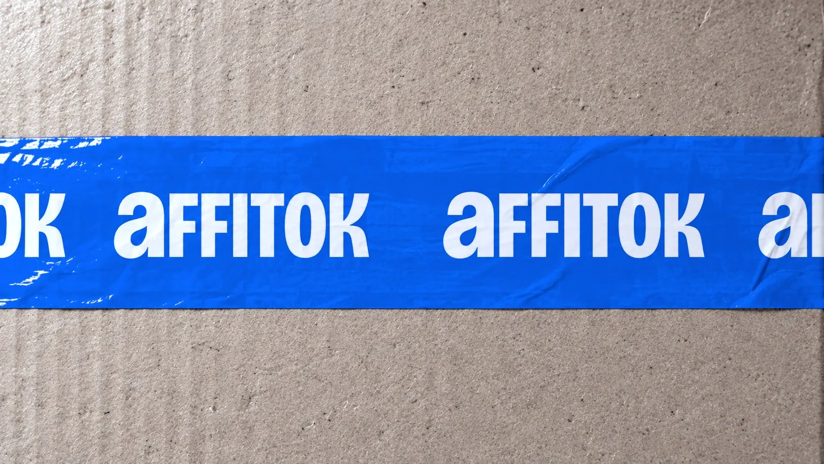 Blue packing tape with the white affitok wordmark